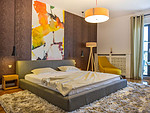 63平米混搭风格三室卧室装修效果图，背景墙创意设计图